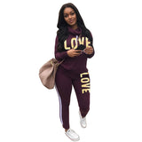 Damen nan sportives Kapuzen-Sweatshirt-Set mit Goldprint und Highwaist-Jogginghose Drune in Violett