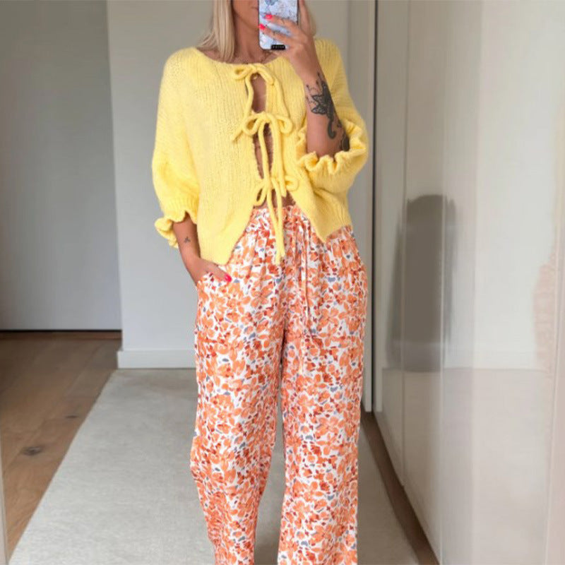 Strickjacke mit Schleifen | Verspielte Eleganz | Lässiger Chic