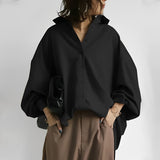 Brittney - Lässige Oversized-Bluse in Schwarz
