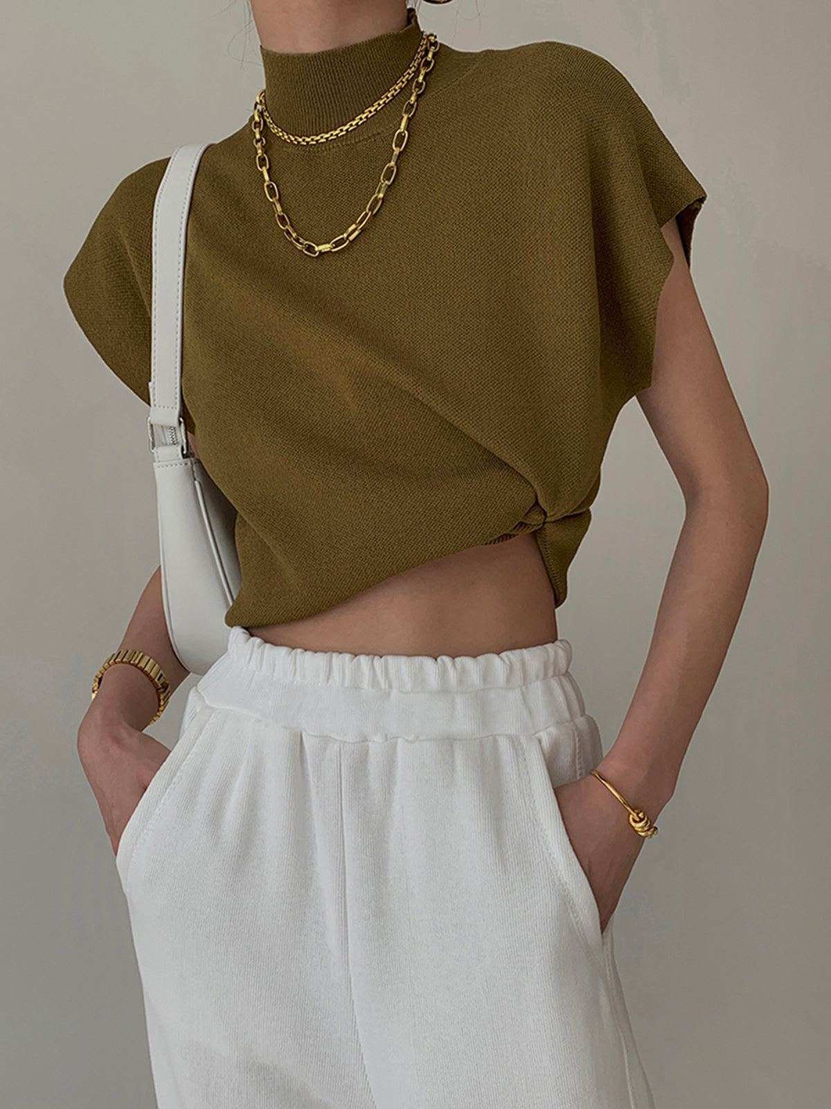 Ärmelloses Stricktop | Hoher Kragen & Fließende Passform | Minimalistisch & Elegant