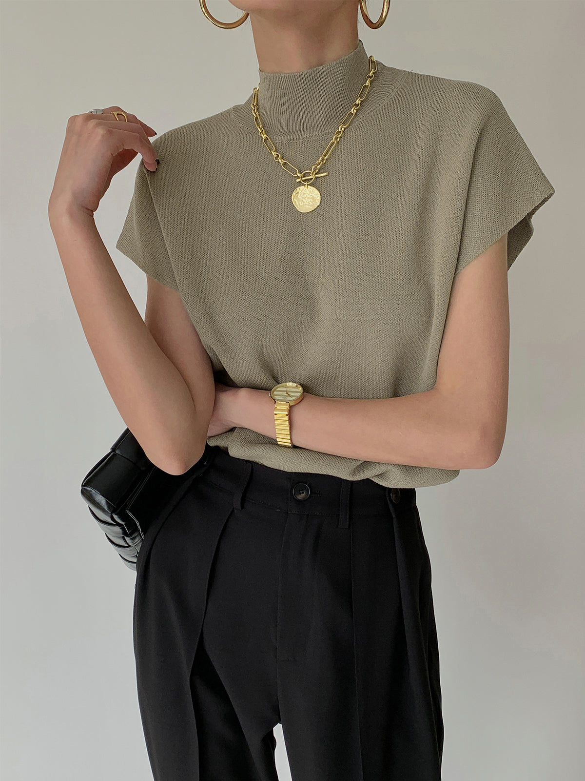Ärmelloses Stricktop | Hoher Kragen & Fließende Passform | Minimalistisch & Elegant