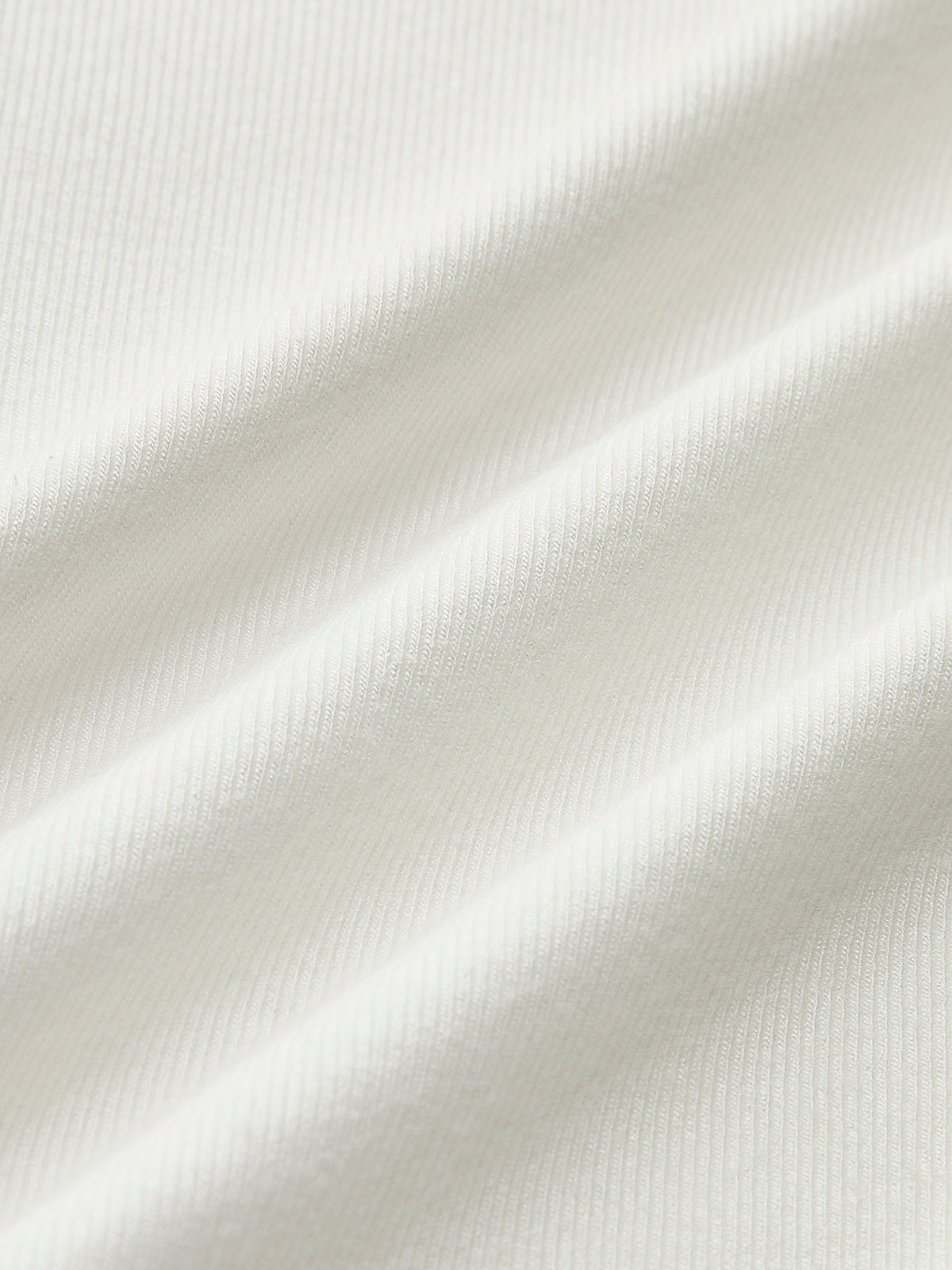 Figurbetontes Langarm-Top | Minimalistisches Design & Ziernähte | Elegant & Modern