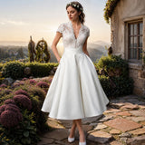 Kieran - Zeitloses A-Linien-Midikleid in Weiß