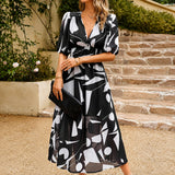 Doherty - Lockere Blumige Midikleid in Schwarz