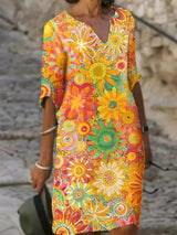Kleid mit Blumendruck und V-Ausschnitt | Damen Frühlingskleid in Gelb