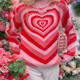 Damen nan oversized Strickpullover mit Herz-Intarsie und Chevron-Muster Drune in Rot