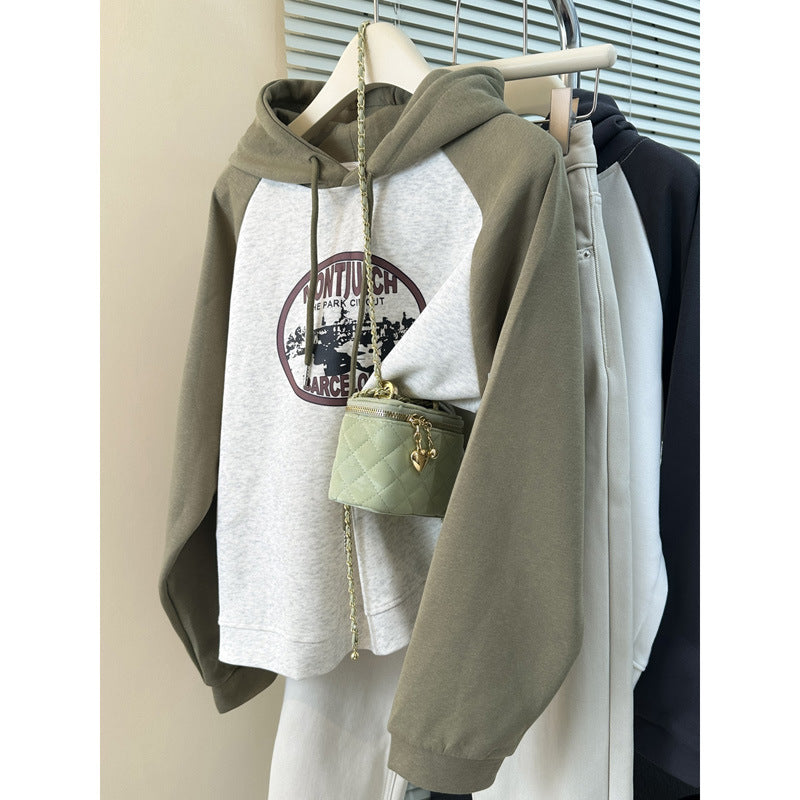 Femme Grafik Pullover Sweatshirt mit einzigartigem Druck und Kontrastärmeln Heidi-Mode