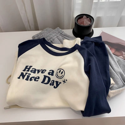 Femme Grafik Langarm-T-Shirt mit Fröhlichem Print Heidi-Mode