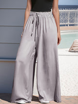 Damen nan weite Palazzo-Hose mit hohem Paperbag-Bund, elastischem Tunnelzug und vorderer Beinschlitz Drune in Grau