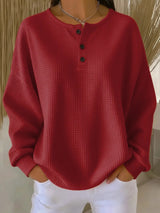 Damen nan Oversized Waffelstrick Henley-Pullover mit Knopfleiste und abgerundetem Saum Drune in Rot