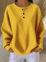 Damen nan Oversized Waffelstrick Henley-Pullover mit Knopfleiste und abgerundetem Saum Drune in Gelb