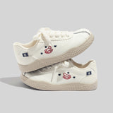 Damen Stilvolle Schnürbare Blaue Ledersneaker in Beige
