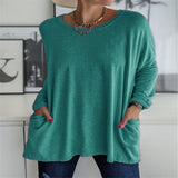 Damen nan oversized Longsleeve-Tunika mit Rundhalsausschnitt, überschnittener Schulter und aufgesetzten Taschen Drune in Pfauenblau