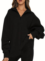 Damen nan Oversized Sweatshirt mit Kurzreißverschluss, Stehkragen und Kängurutasche Drune in Schwarz