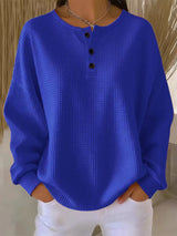 Damen nan Oversized Waffelstrick Henley-Pullover mit Knopfleiste und abgerundetem Saum Drune in Blau
