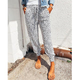 Damen nan lässige Leoparden-Print Jogginghose mit Tunnelzug, Eingrifftaschen und elastischen Bündchen Drune in Weiß