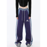 Damen nan weite Jogginghose mit hoher Taille und Jeansstoffeinsätzen sowie Seitenstreifen Drune in Violett 21113