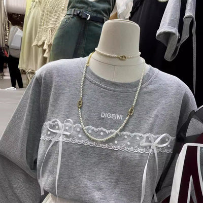 Femme Spitzenverzierte Freizeit-T-Shirt Heidi-Mode