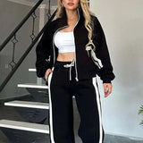 Damen nan athletisches Zweiteiler-Set aus French Terry mit Reißverschluss Cropped Jacke und weitem Highwaist Jogger Drune in Schwarz