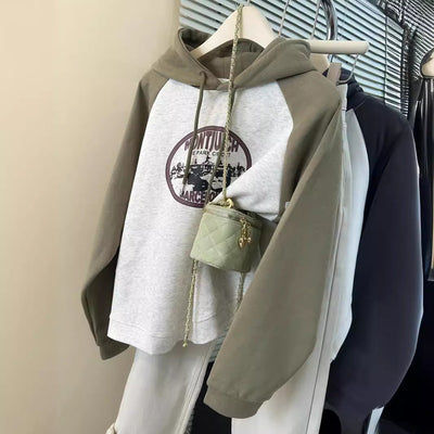 Femme Grafik Pullover Sweatshirt mit einzigartigem Druck und Kontrastärmeln Heidi-Mode