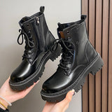 Damen nan knöchelhohe Combat-Boots in Lackoptik mit robuster Profilsohle und seitlichem Reißverschluss Drune in Schwarz
