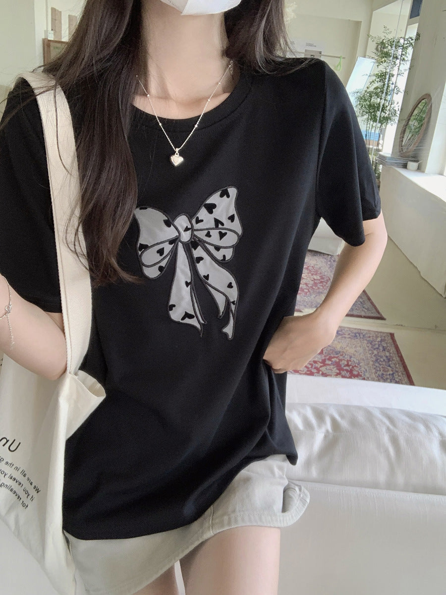 Femme Verspieltes Schleifen Grafik T-Shirt Heidi-Mode