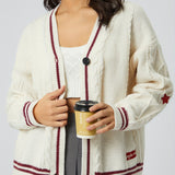 Damen nan oversized Zopfstrick Cardigan mit V-Ausschnitt und kontrastierenden Strickkanten Drune in Aprikosenrot