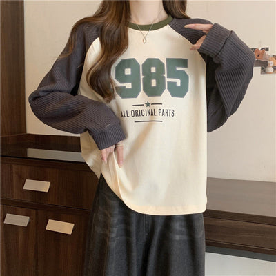 Femme Relaxed Fit Grafik Sweatshirt mit Kontrast-Rippärmeln Heidi-Mode