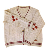Damen nan oversized Zopfmuster-Cardigan mit V-Ausschnitt, Knopfleiste und Sternapplikationen Drune in Aprikosenrot