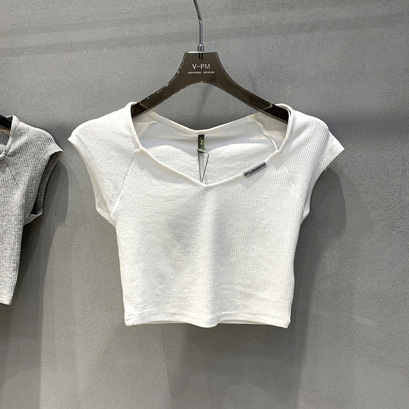 Femme Ripp Crop Top mit Übergroßem V-Ausschnitt Heidi-Mode