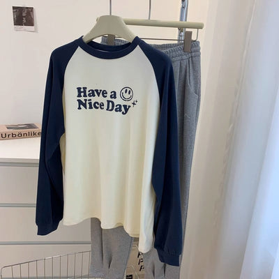 Femme Grafik Langarm-T-Shirt mit Fröhlichem Print Heidi-Mode