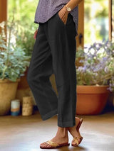 Damen nan lässige Cropped-Hose mit geradem Bein, dezenter Bügelfalte und seitlichen Eingrifftaschen Drune in Schwarz