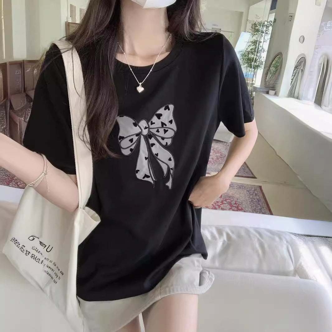 Femme Verspieltes Schleifen Grafik T-Shirt Heidi-Mode