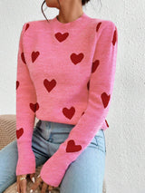 Damen nan kaschmirähnlicher Feinstrickpullover mit Allover-Herzmotiv, Rundhalsausschnitt und verlängerten Bündchen Drune in Rosa