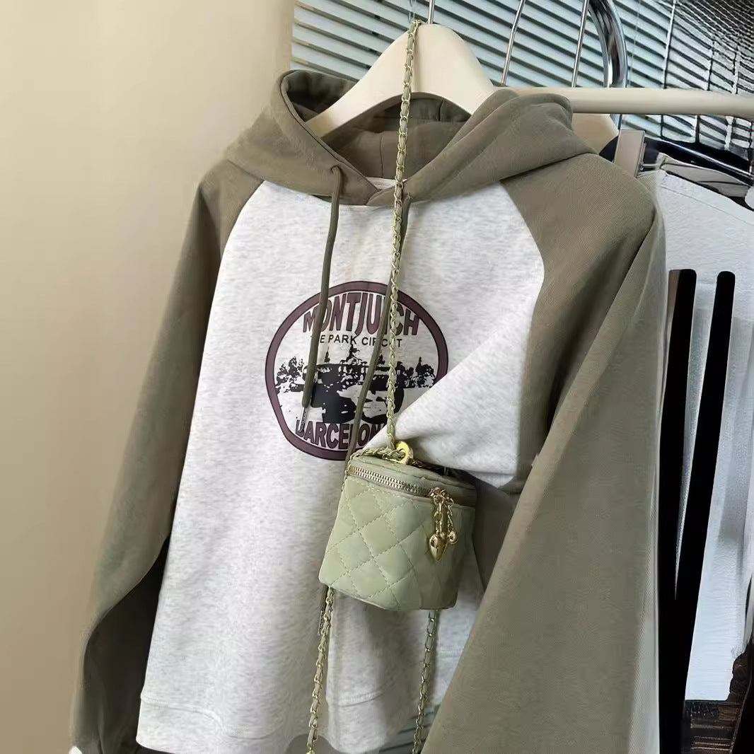 Femme Grafik Pullover Sweatshirt mit einzigartigem Druck und Kontrastärmeln Heidi-Mode