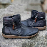 Damen nan lederoptik gefütterte Stiefelette mit seitlichem Reißverschluss und rutschfester Laufsohle Drune in Schwarz
