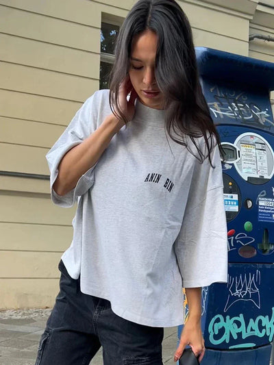 Oversized Damen T-Shirt in Grau mit kleinem Logo-Print