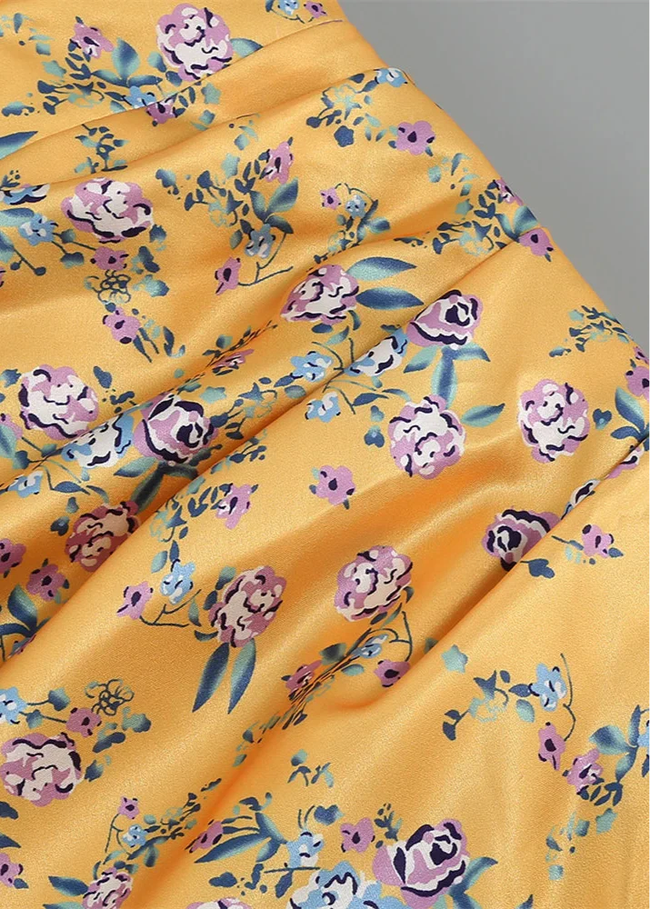 Asymmetrisches Maxikleid | Florales Muster & Rüschen | Elegante Leichtigkeit