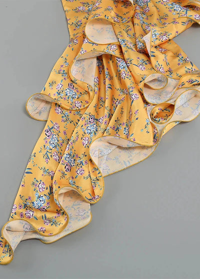 Asymmetrisches Maxikleid | Florales Muster & Rüschen | Elegante Leichtigkeit