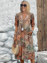 Harper – Elegantes Midikleid mit Blumenmuster in Beige