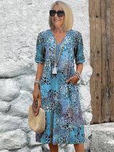 Harper – Elegantes Midikleid mit Blumenmuster in Blau