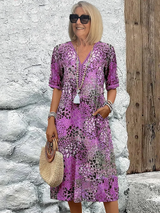 Harper – Elegantes Midikleid mit Blumenmuster in Violett