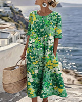 Xenjia | Lockeres Midikleid mit buntem Blumenprint in Grün